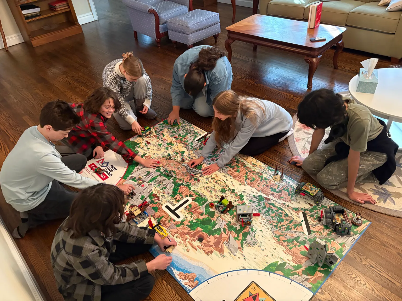 Overhead shot of the group working on all sides of the FLL field